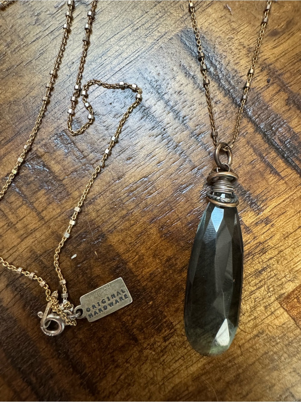 Gold Necklace with Teardrop Smoky Grey Crystal Pendant